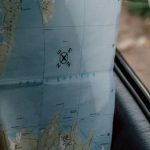 Itineraries - Person in Plaid Long Sleeve Shirt Holding a Map