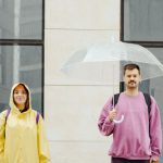 Owners - Dogs in Between the Man and Woman Standing