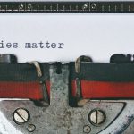 Stories - Black and Red Typewriter