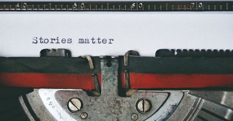 Stories - Black and Red Typewriter