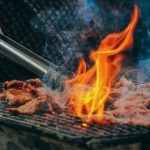 Barbecue - Close-Up Photo of Man Cooking Meat